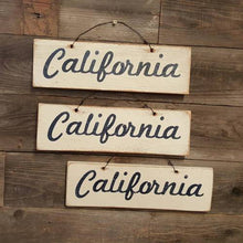 Weathered Souvenir Signs - visitors